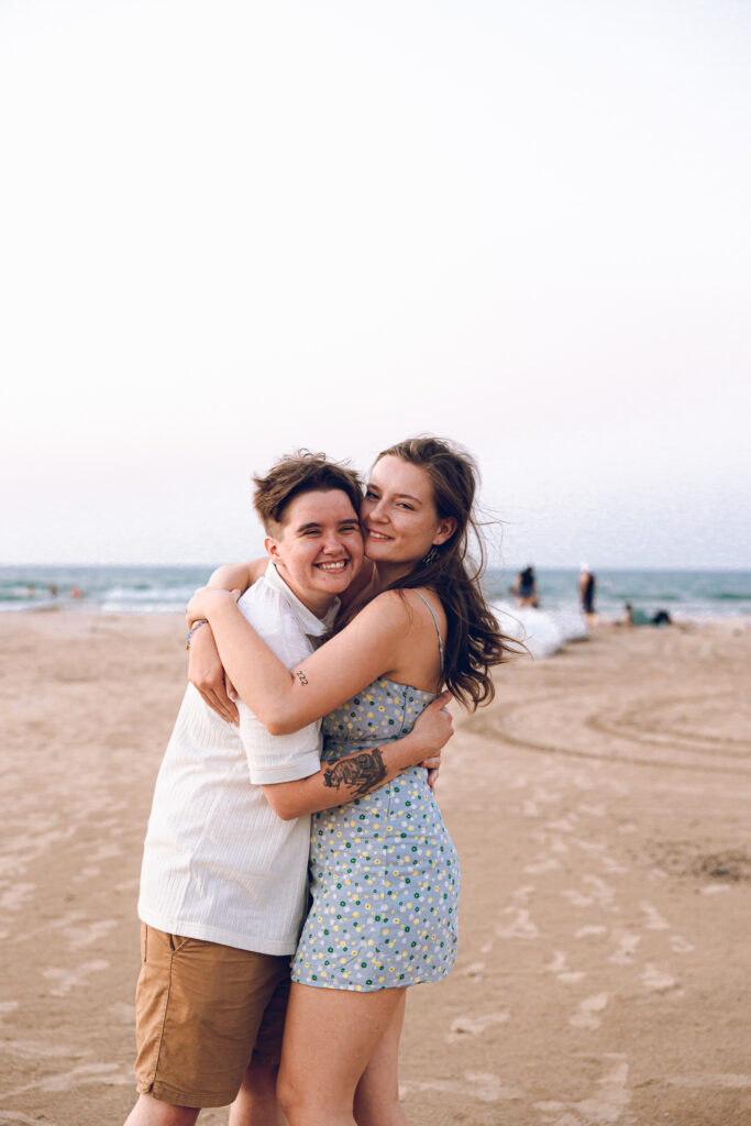 A queer proposal on Montrose Beach at sunset