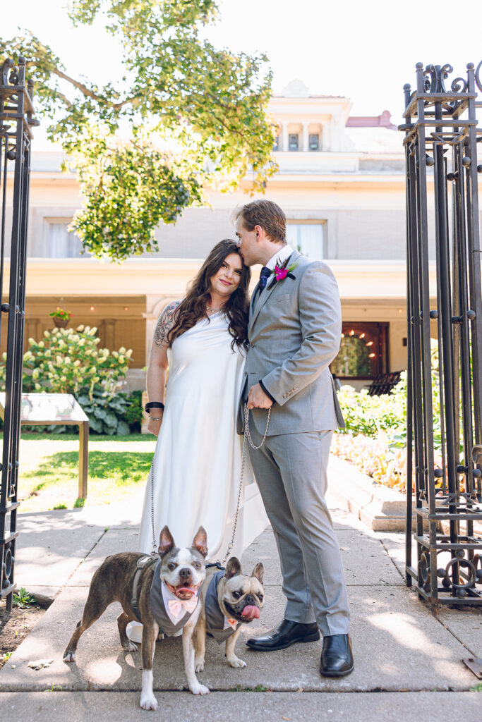 A couple gets celebrates their wedding at Pleasant House in Oak Park, Illinois.