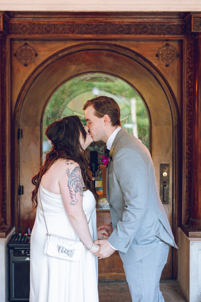 A couple gets celebrates their wedding at Pleasant House in Oak Park, Illinois.