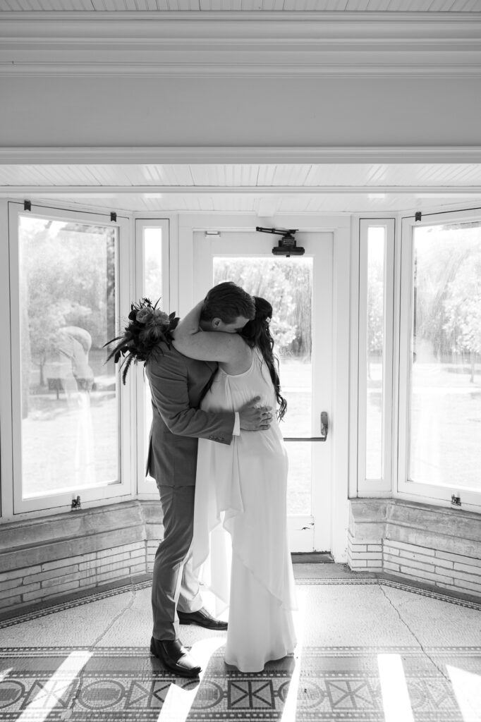 A couple gets celebrates their wedding at Pleasant House in Oak Park, Illinois.