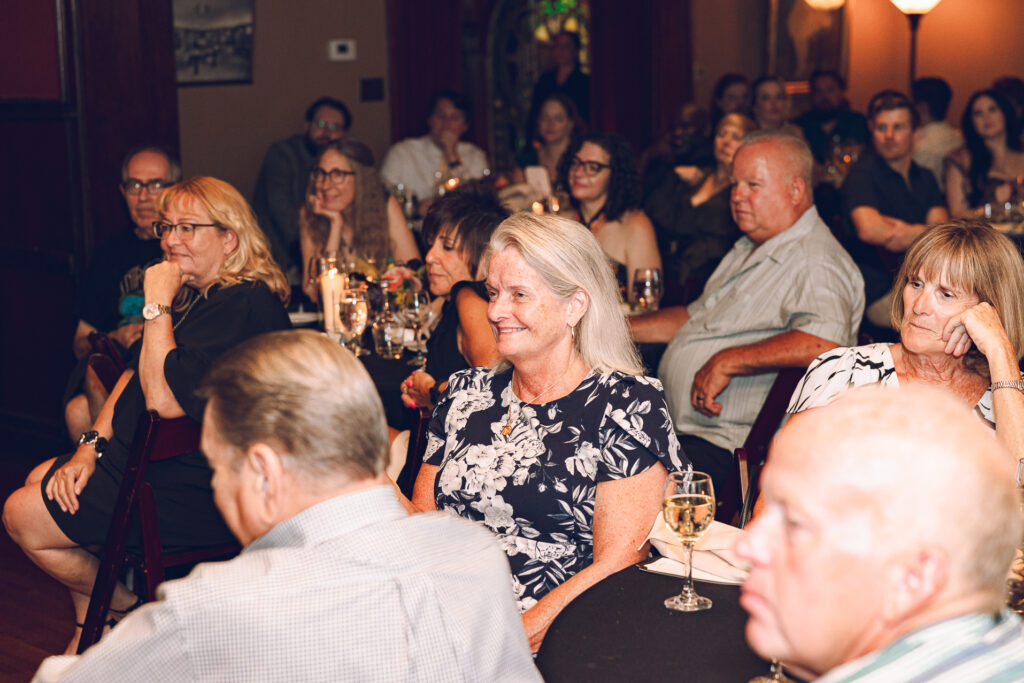 A couple gets celebrates their wedding at Pleasant House in Oak Park, Illinois.