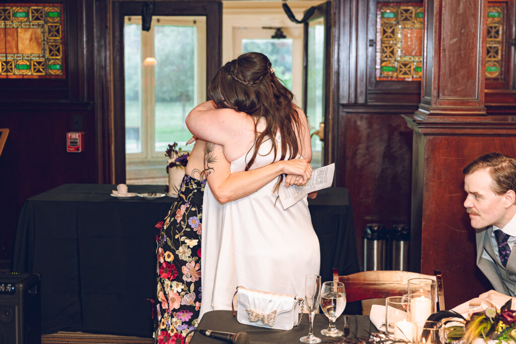 A couple gets celebrates their wedding at Pleasant House in Oak Park, Illinois.