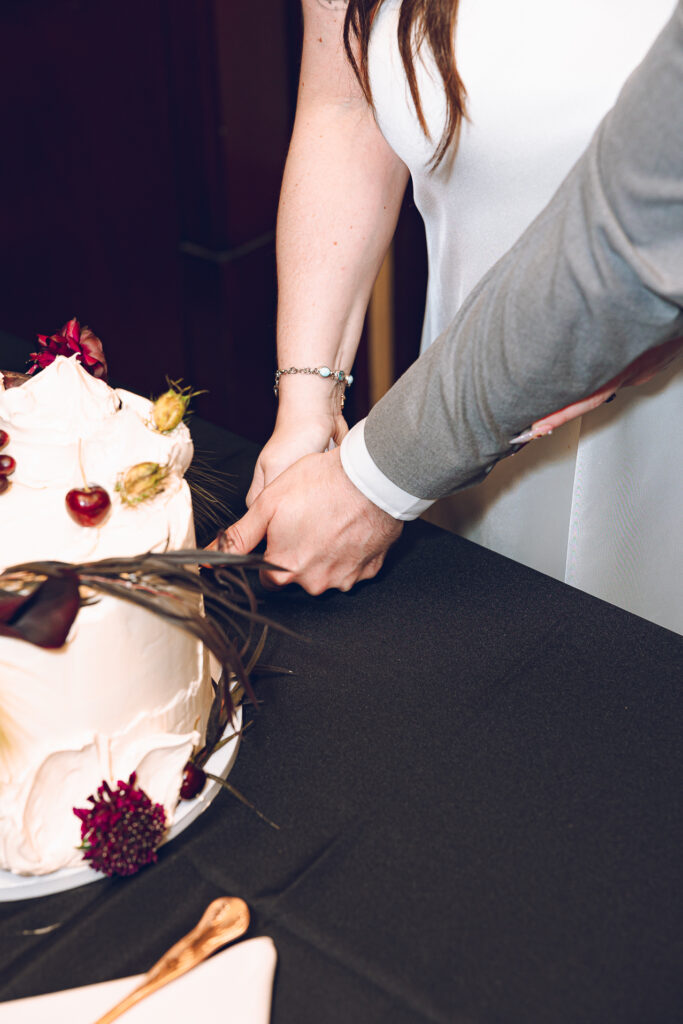 A couple gets celebrates their wedding at Pleasant House in Oak Park, Illinois.