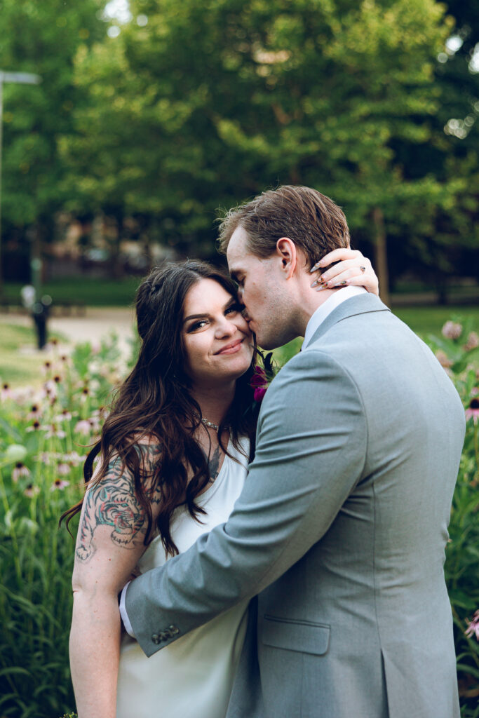 A couple gets celebrates their wedding at Pleasant House in Oak Park, Illinois.