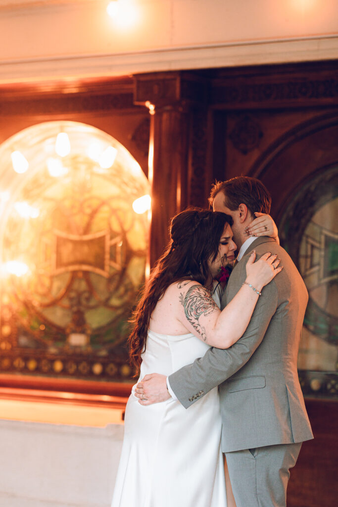 A couple gets celebrates their wedding at Pleasant House in Oak Park, Illinois.