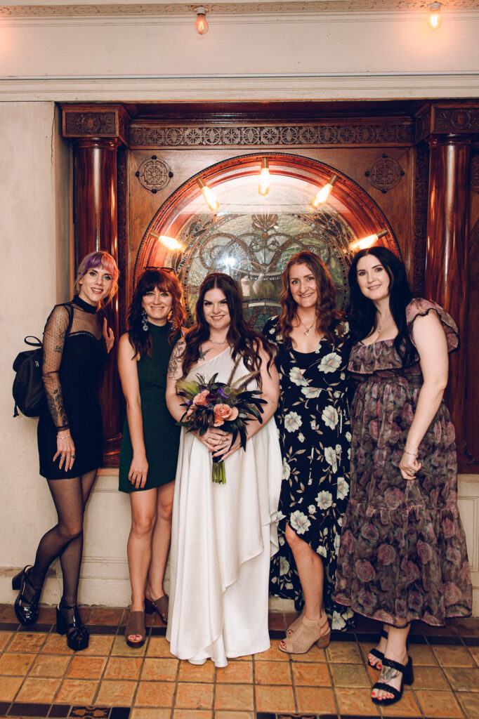 A couple gets celebrates their wedding at Pleasant House in Oak Park, Illinois.