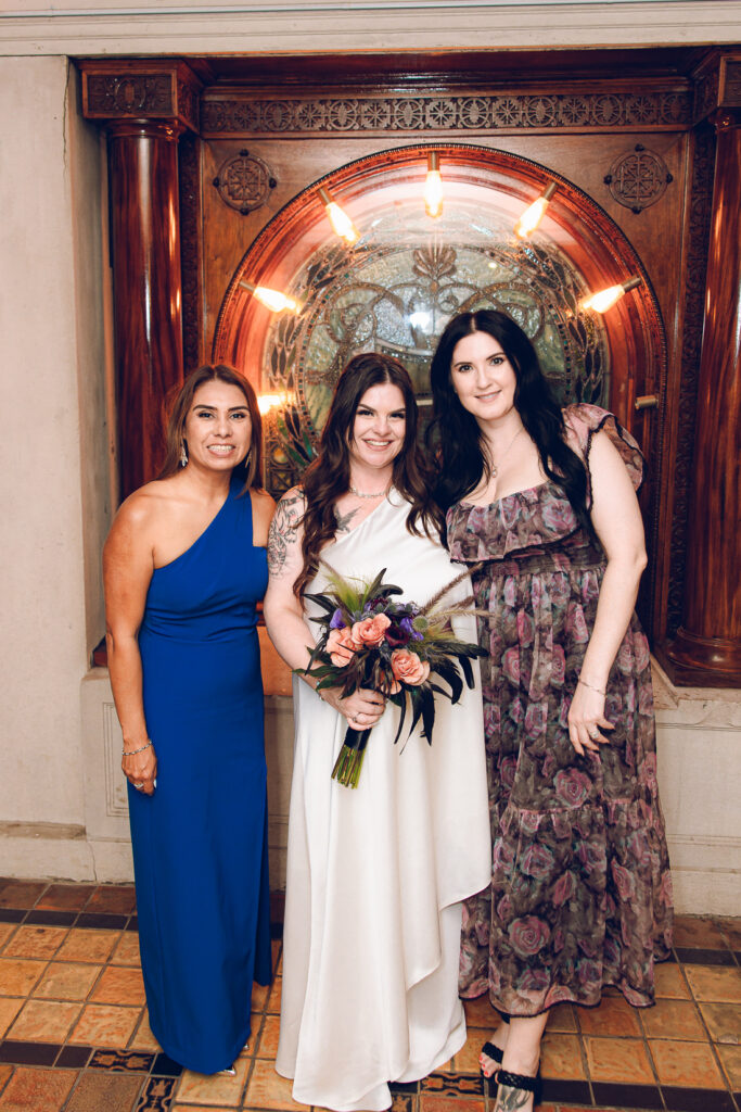 A couple gets celebrates their wedding at Pleasant House in Oak Park, Illinois.