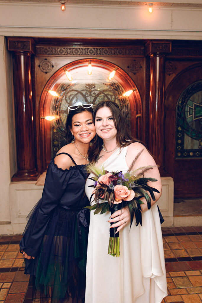 A couple gets celebrates their wedding at Pleasant House in Oak Park, Illinois.