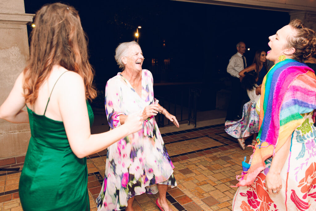 A couple gets celebrates their wedding at Pleasant House in Oak Park, Illinois.