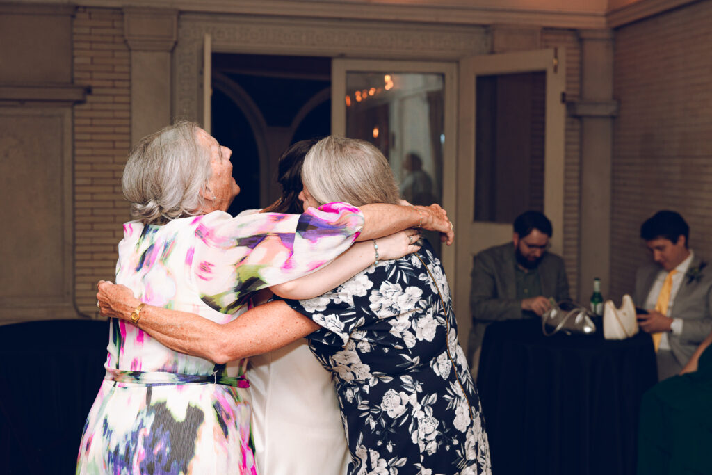 A couple gets celebrates their wedding at Pleasant House in Oak Park, Illinois.