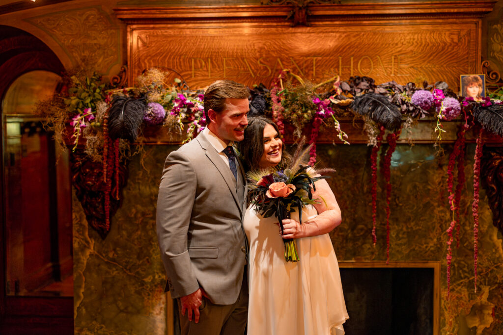 A couple gets celebrates their wedding at Pleasant House in Oak Park, Illinois.