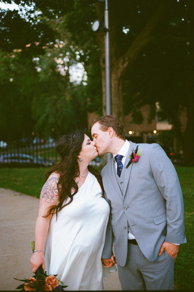 A couple gets celebrates their wedding at Pleasant House in Oak Park, Illinois.