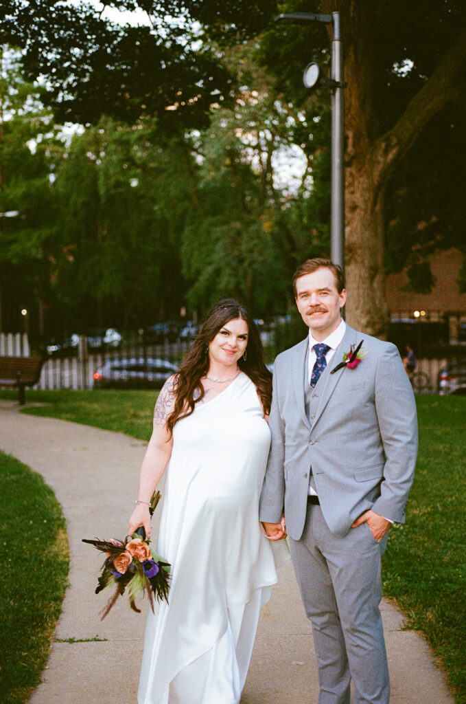 A couple gets celebrates their wedding at Pleasant House in Oak Park, Illinois.