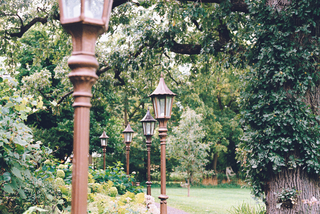 A queer couple celebrates their wedding at The Grove Redfield Estate in Glenview, Illinois.