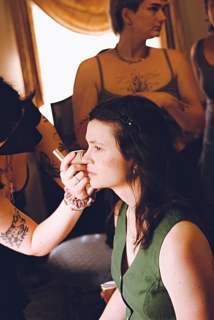 A queer couple celebrates their wedding at The Grove Redfield Estate in Glenview, Illinois.
