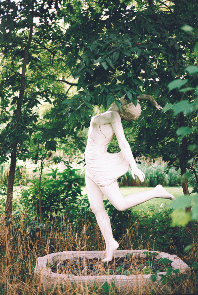 A queer couple celebrates their wedding at The Grove Redfield Estate in Glenview, Illinois.