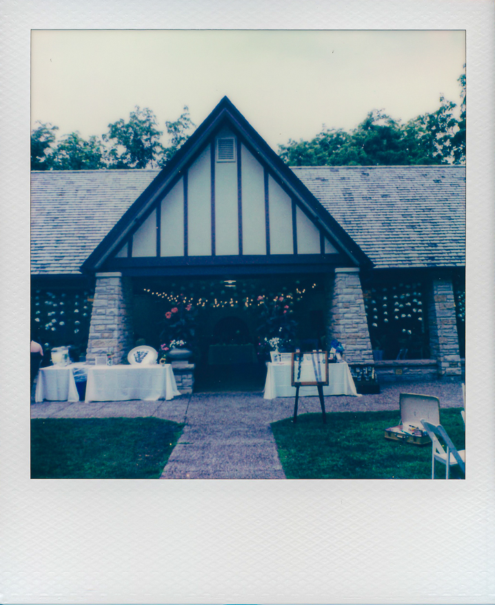 A queer couple celebrates their wedding at The Grove Redfield Estate in Glenview, Illinois.