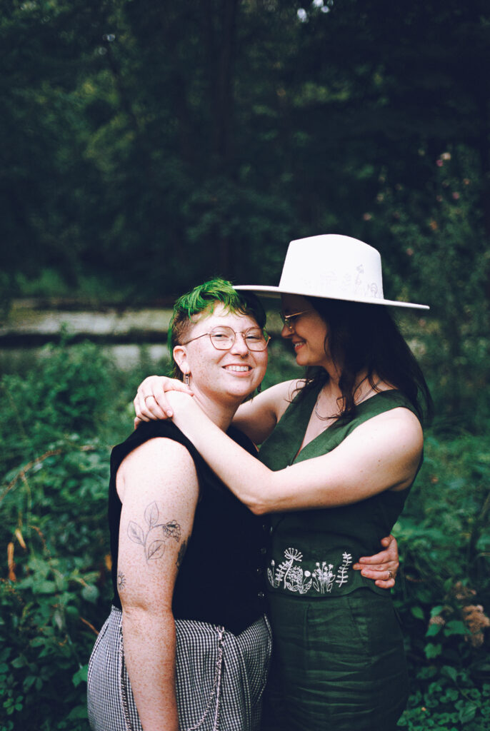 A queer couple celebrates their wedding at The Grove Redfield Estate in Glenview, Illinois.