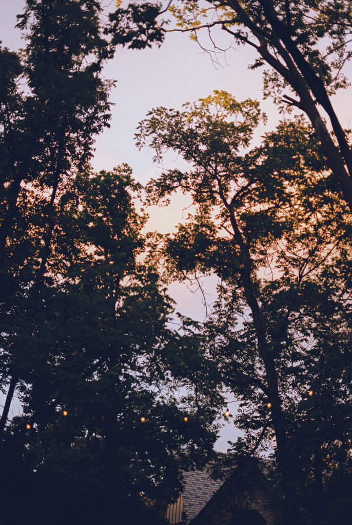 A queer couple celebrates their wedding at The Grove Redfield Estate in Glenview, Illinois.