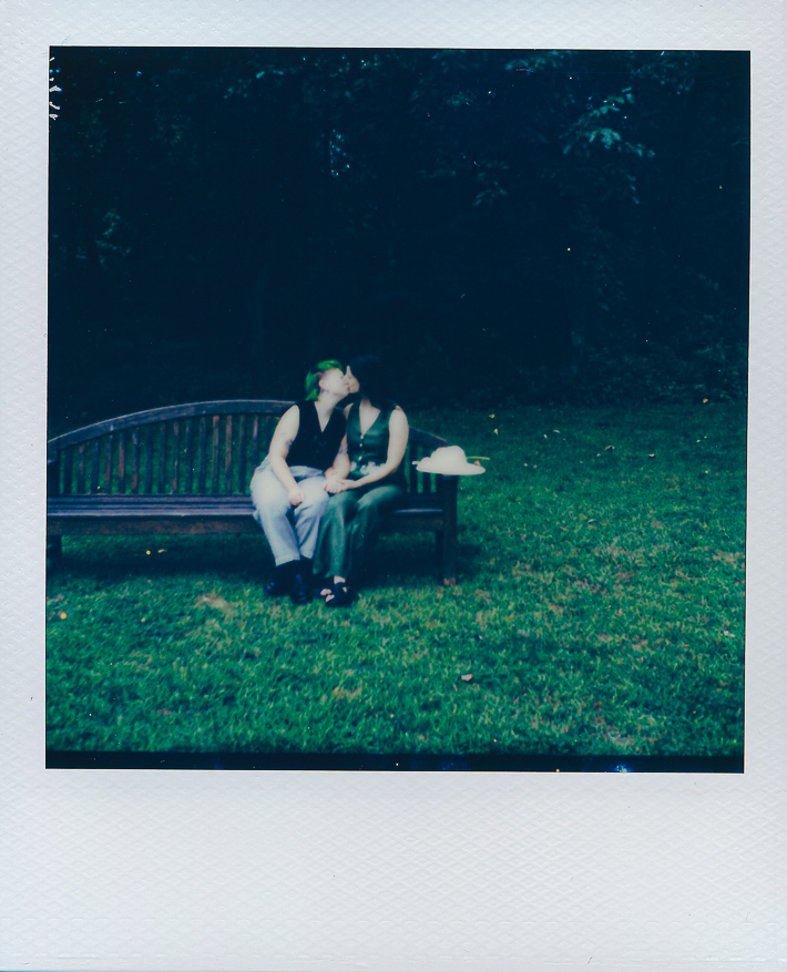 A queer couple celebrates their wedding at The Grove Redfield Estate in Glenview, Illinois.