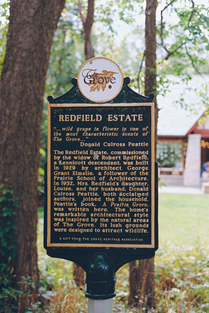 A queer couple celebrates their wedding at The Grove Redfield Estate in Glenview, Illinois.