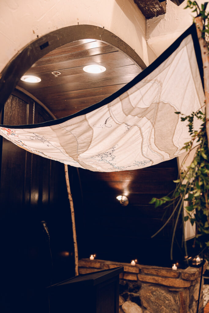 A queer couple celebrates their wedding at Osteria Via Stato