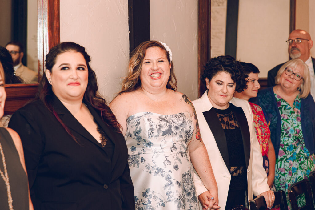 A queer couple celebrates their wedding at Osteria Via Stato