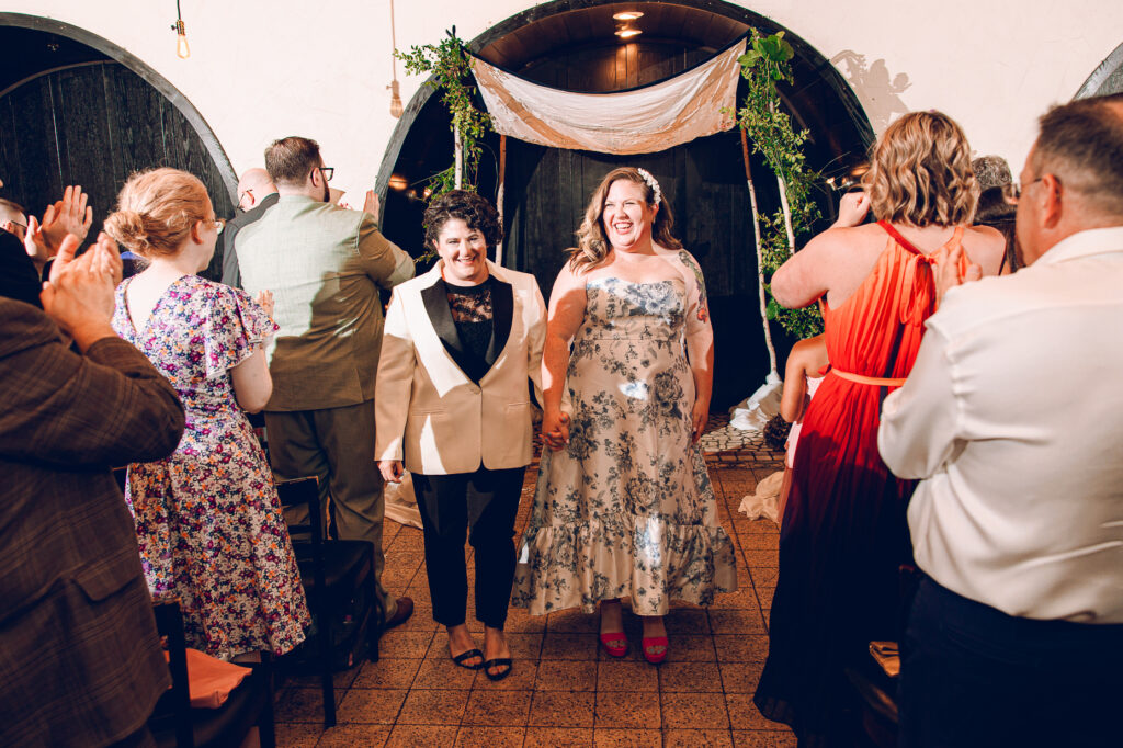 A queer couple celebrates their wedding at Osteria Via Stato