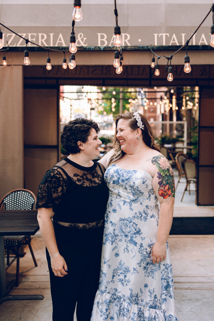 A queer couple celebrates their wedding at Osteria Via Stato