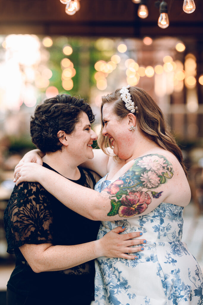 A queer couple celebrates their wedding at Osteria Via Stato