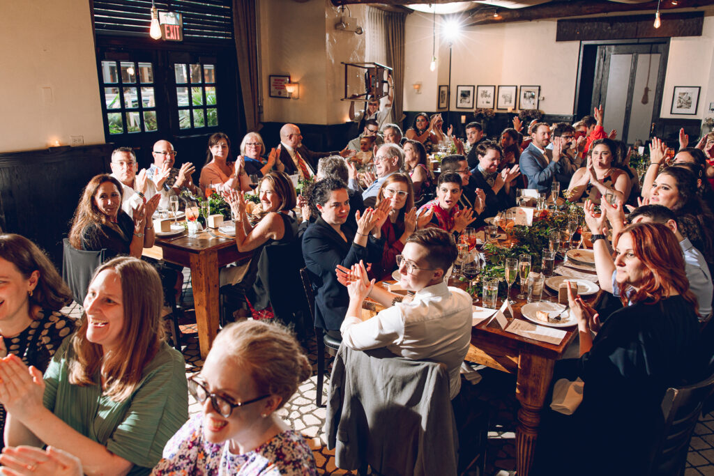 A queer couple celebrates their wedding at Osteria Via Stato