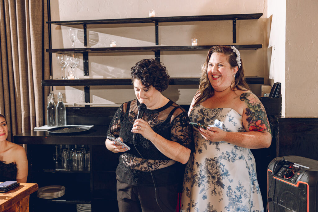A queer couple celebrates their wedding at Osteria Via Stato