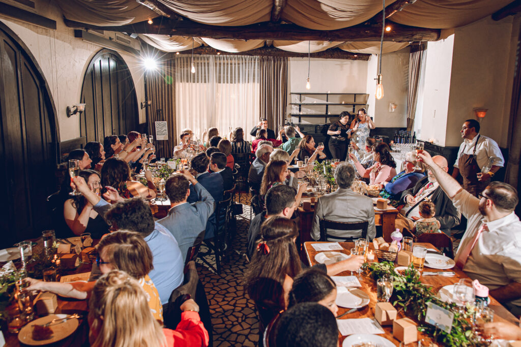 A queer couple celebrates their wedding at Osteria Via Stato