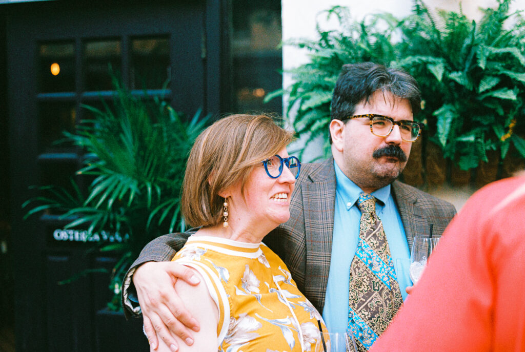 A queer couple celebrates their wedding at Osteria Via Stato