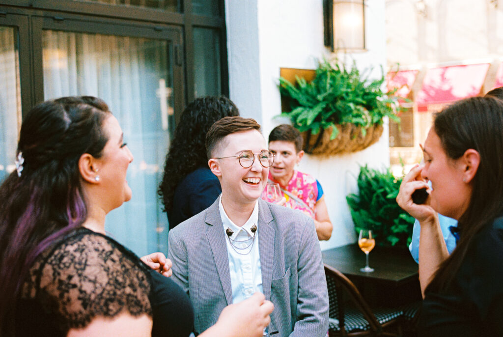 A queer couple celebrates their wedding at Osteria Via Stato