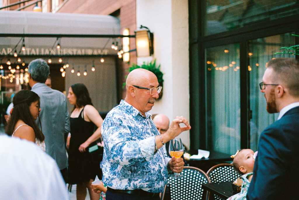 A queer couple celebrates their wedding at Osteria Via Stato