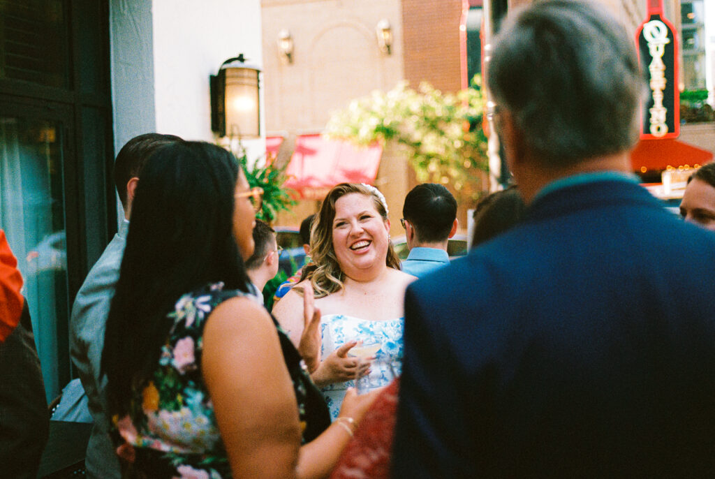 A queer couple celebrates their wedding at Osteria Via Stato