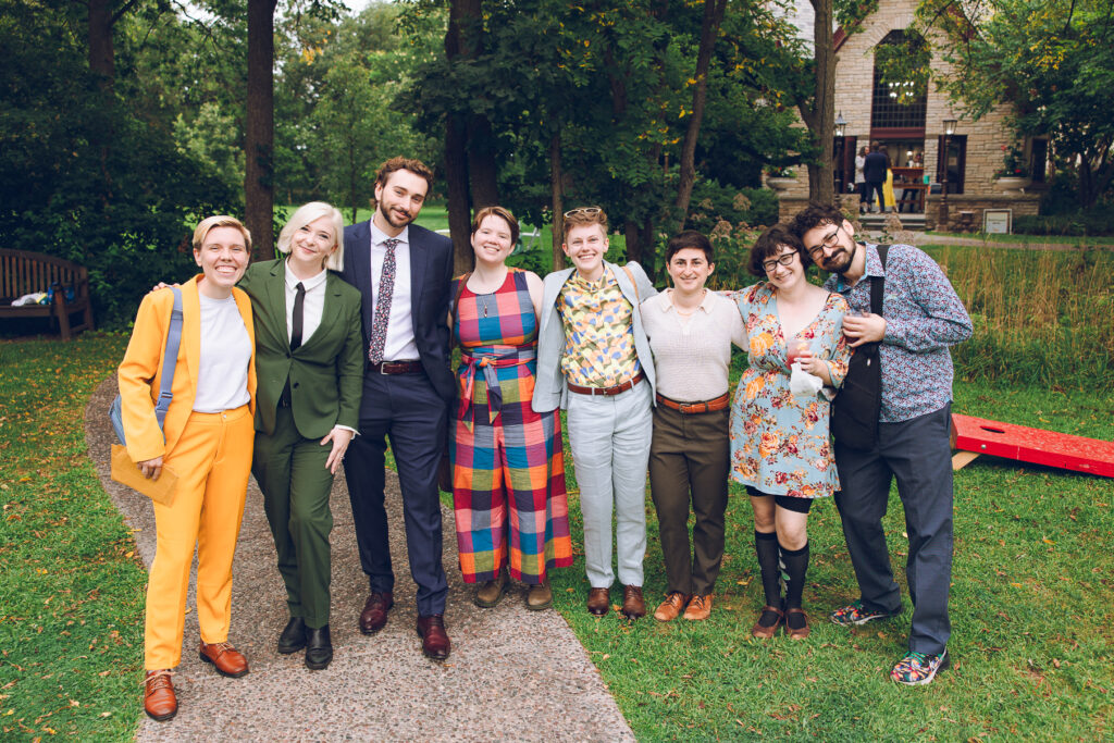 A queer couple celebrates their wedding at The Grove Redfield Estate in Glenview, Illinois.