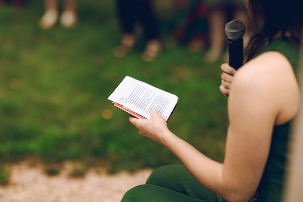 A queer couple celebrates their wedding at The Grove Redfield Estate in Glenview, Illinois.