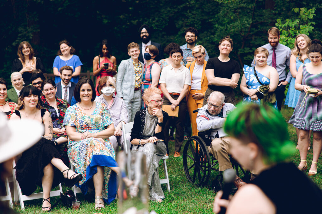 A queer couple celebrates their wedding at The Grove Redfield Estate in Glenview, Illinois.