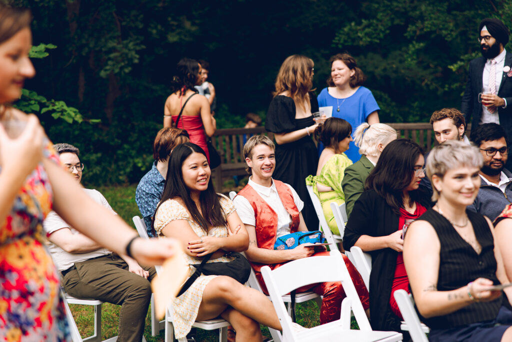 A queer couple celebrates their wedding at The Grove Redfield Estate in Glenview, Illinois.