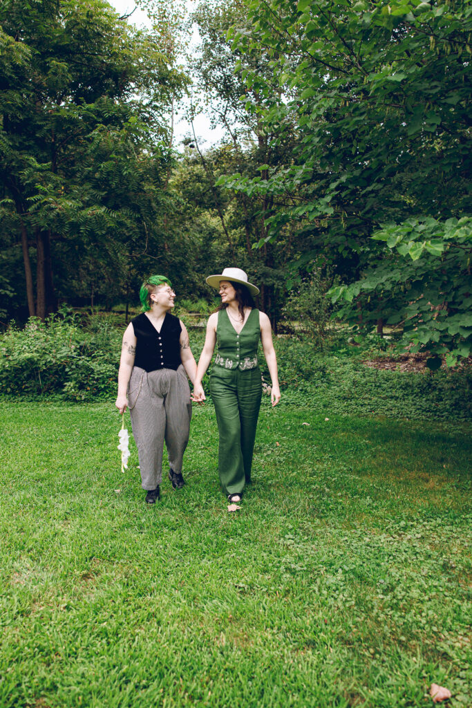 A queer couple celebrates their wedding at The Grove Redfield Estate in Glenview, Illinois.