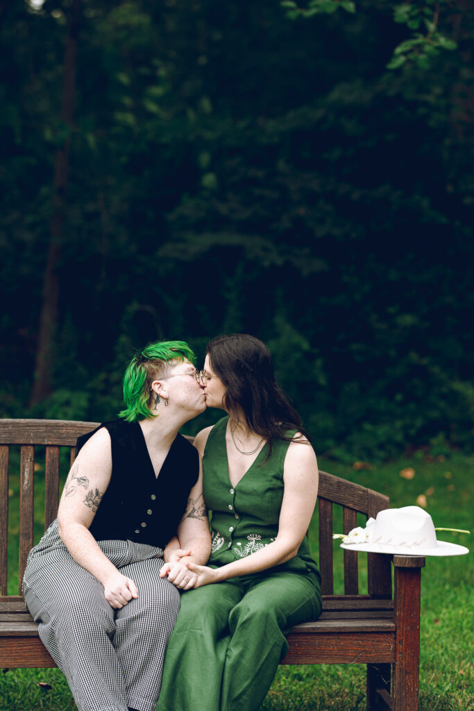 A queer couple celebrates their wedding at The Grove Redfield Estate in Glenview, Illinois.