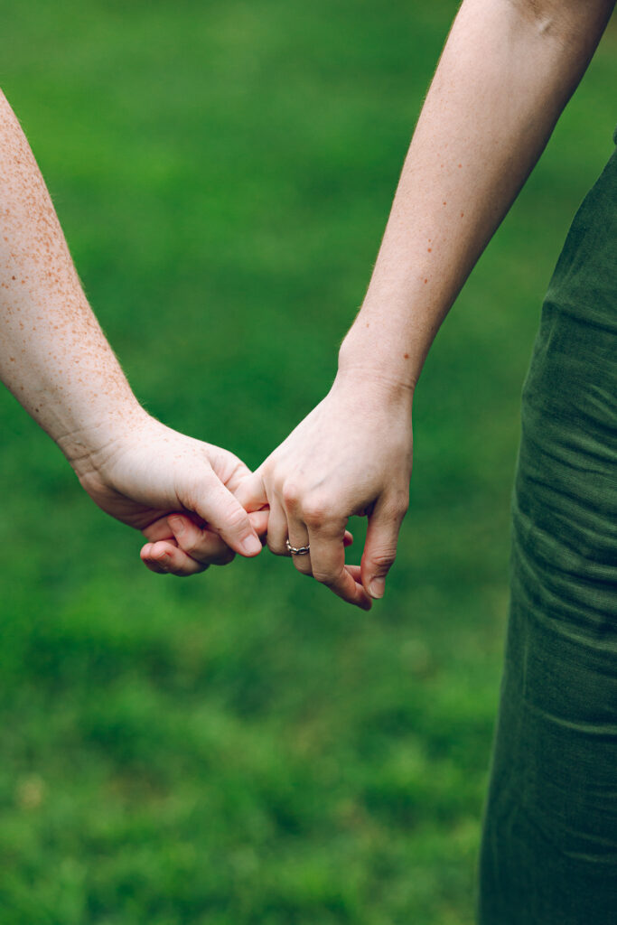 A queer couple celebrates their wedding at The Grove Redfield Estate in Glenview, Illinois.