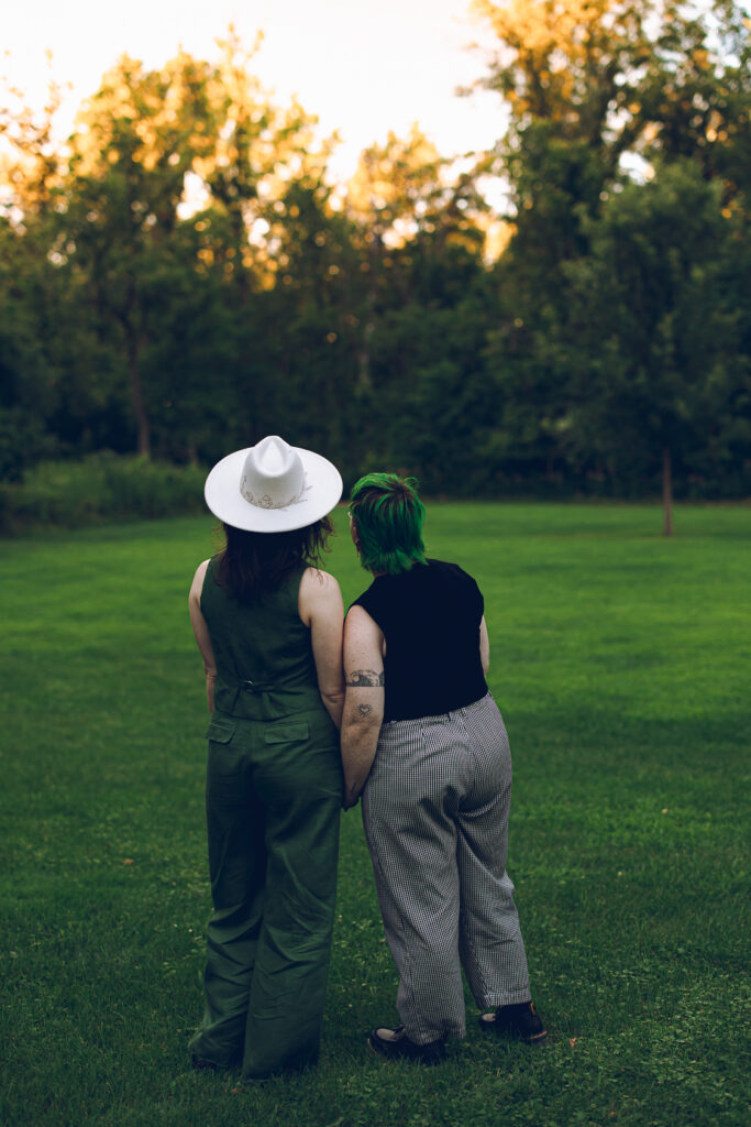 A queer couple celebrates their wedding at The Grove Redfield Estate in Glenview, Illinois.