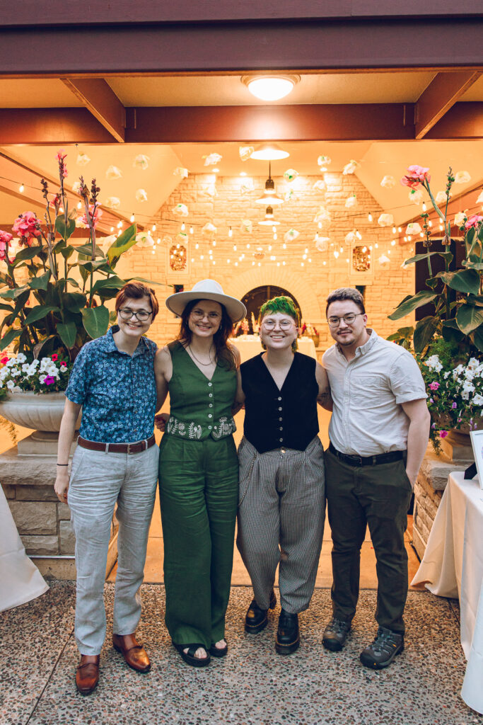 A queer couple celebrates their wedding at The Grove Redfield Estate in Glenview, Illinois.