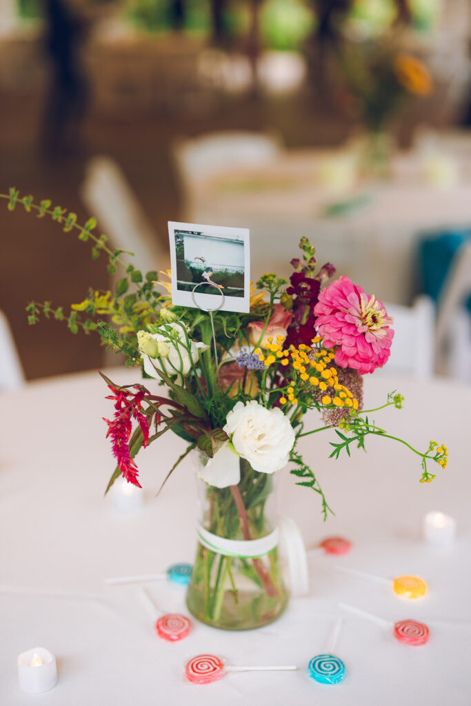 A queer couple celebrates their wedding at The Grove Redfield Estate in Glenview, Illinois.