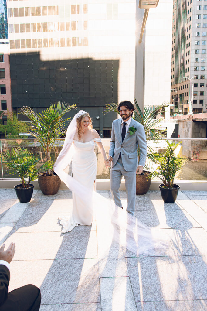 A couple gets married at Porter Kitchen and Deck on the Chicago River.